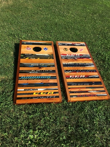 Buddy of mine got custom corn hole boards made with every hockey team he  has played for over the years. : r/hockey